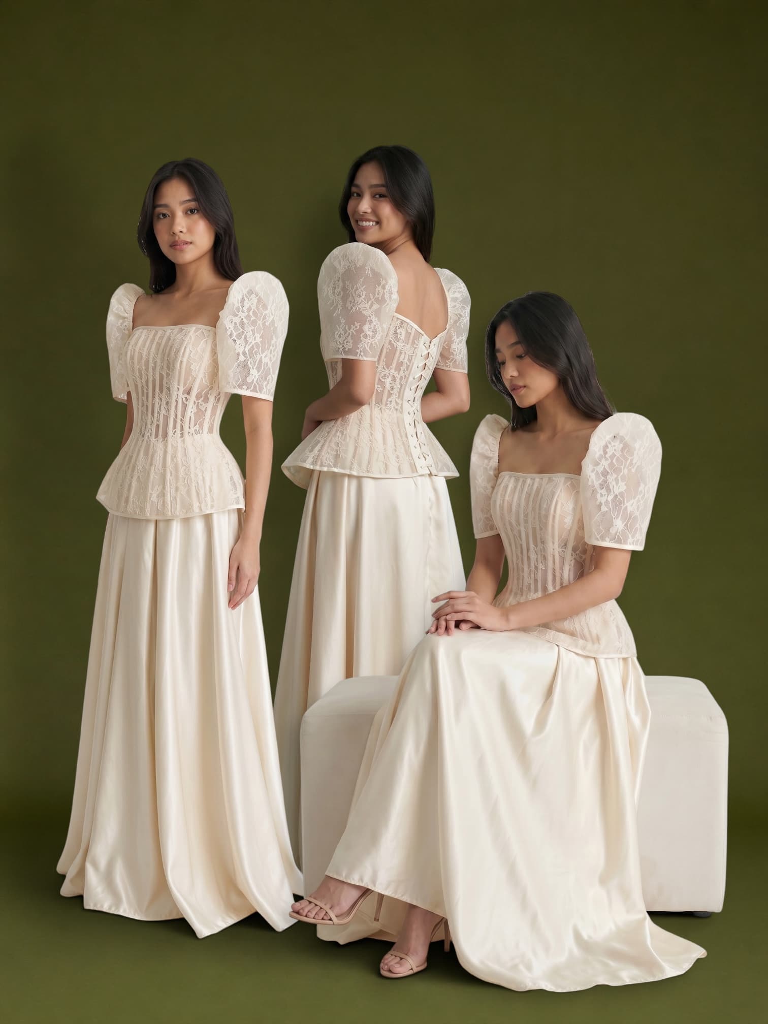 Leonor, a lace corset top with a silk satin ball skirt, photographed in three poses on an olive backdrop